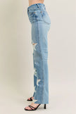 90s rigid distressed denim jeans, high-waisted straight fit, faded light blue, frayed leg details