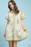 Tan linen dress with gold fern print and ruffled tiered hem featuring button front and side pockets