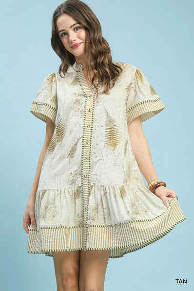 Tan linen dress with gold fern print and ruffled tiered hem featuring button front and side pockets