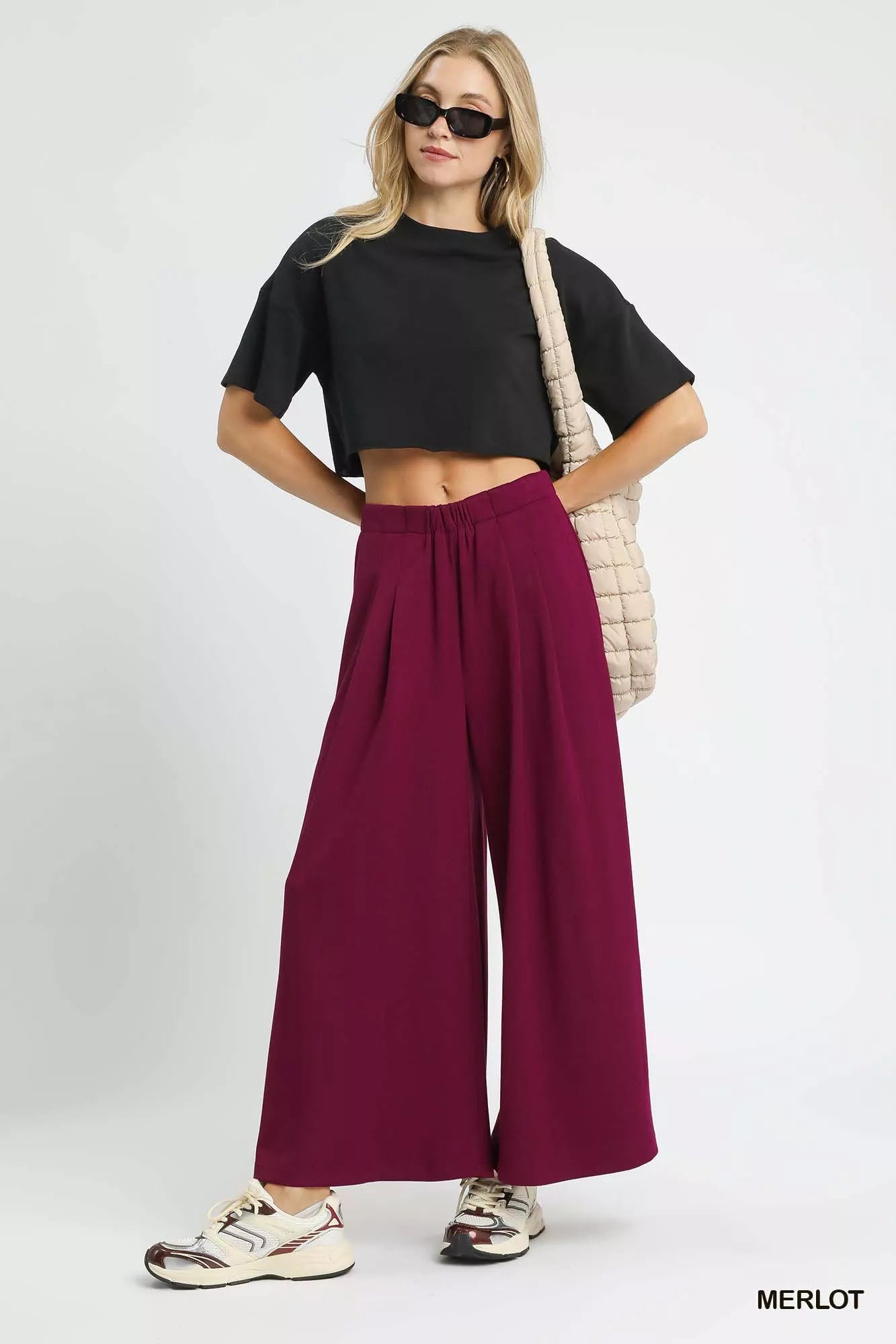 Soft merlot red wide-leg pants with structured pintuck detailing