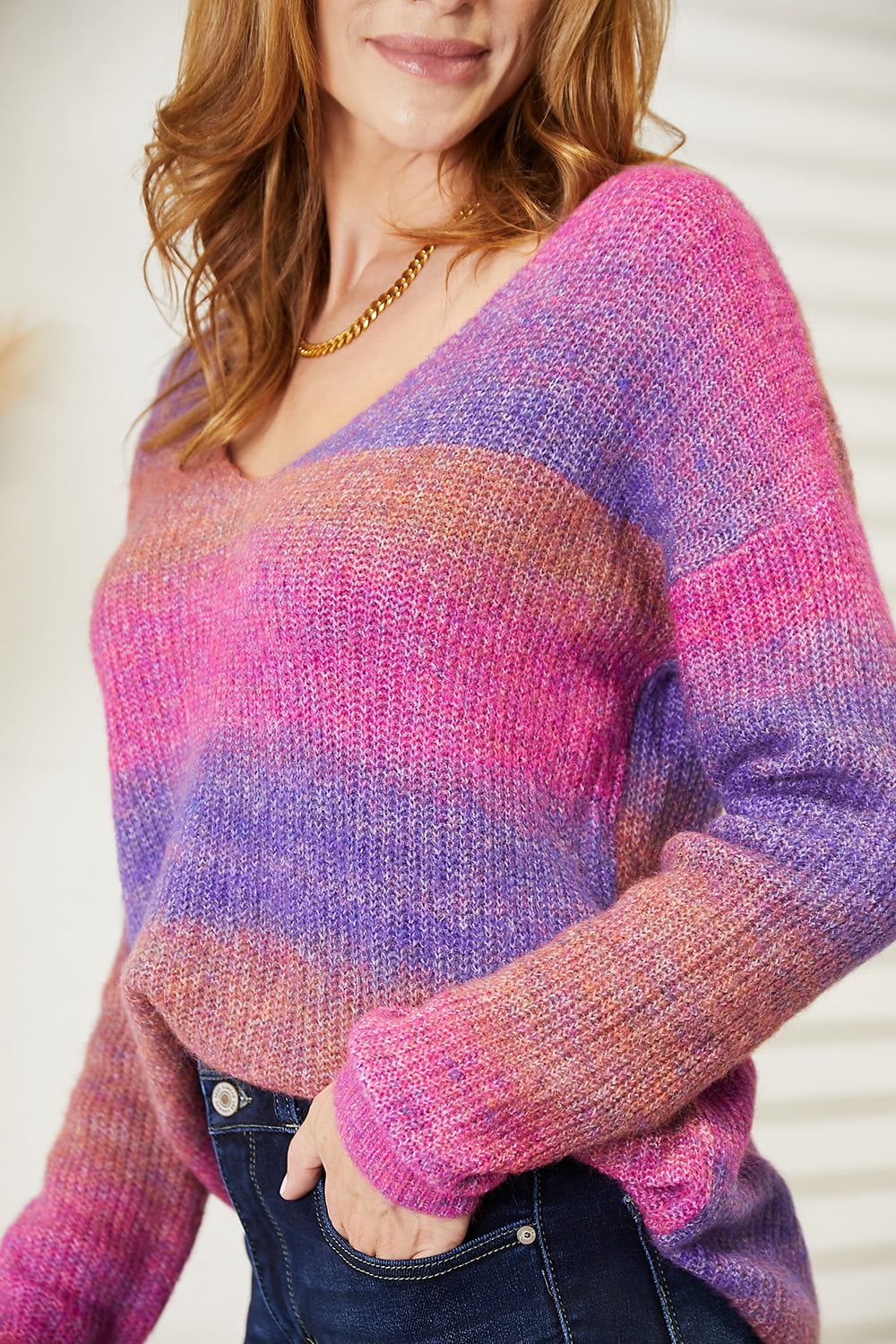 Close detail of ribbed pullover fabric in violet multi