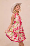 Side profile of floral mini dress showcasing tiered ruffle detail