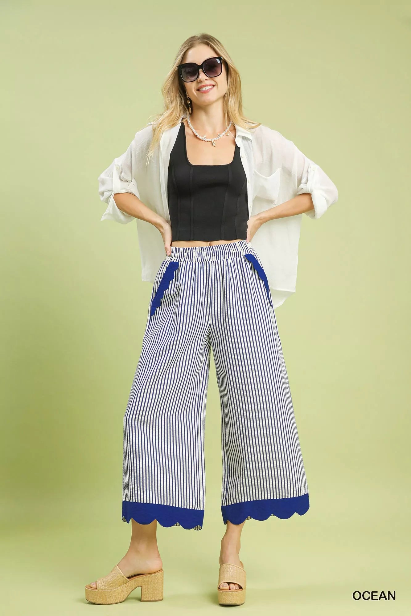 Lightweight wide-leg pants in ocean blue with scalloped hem