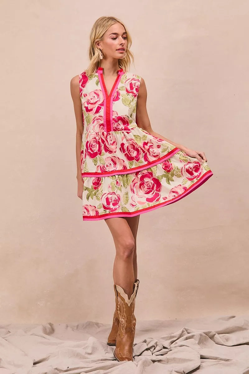 Coral pink floral mini dress with tiered ruffle hem