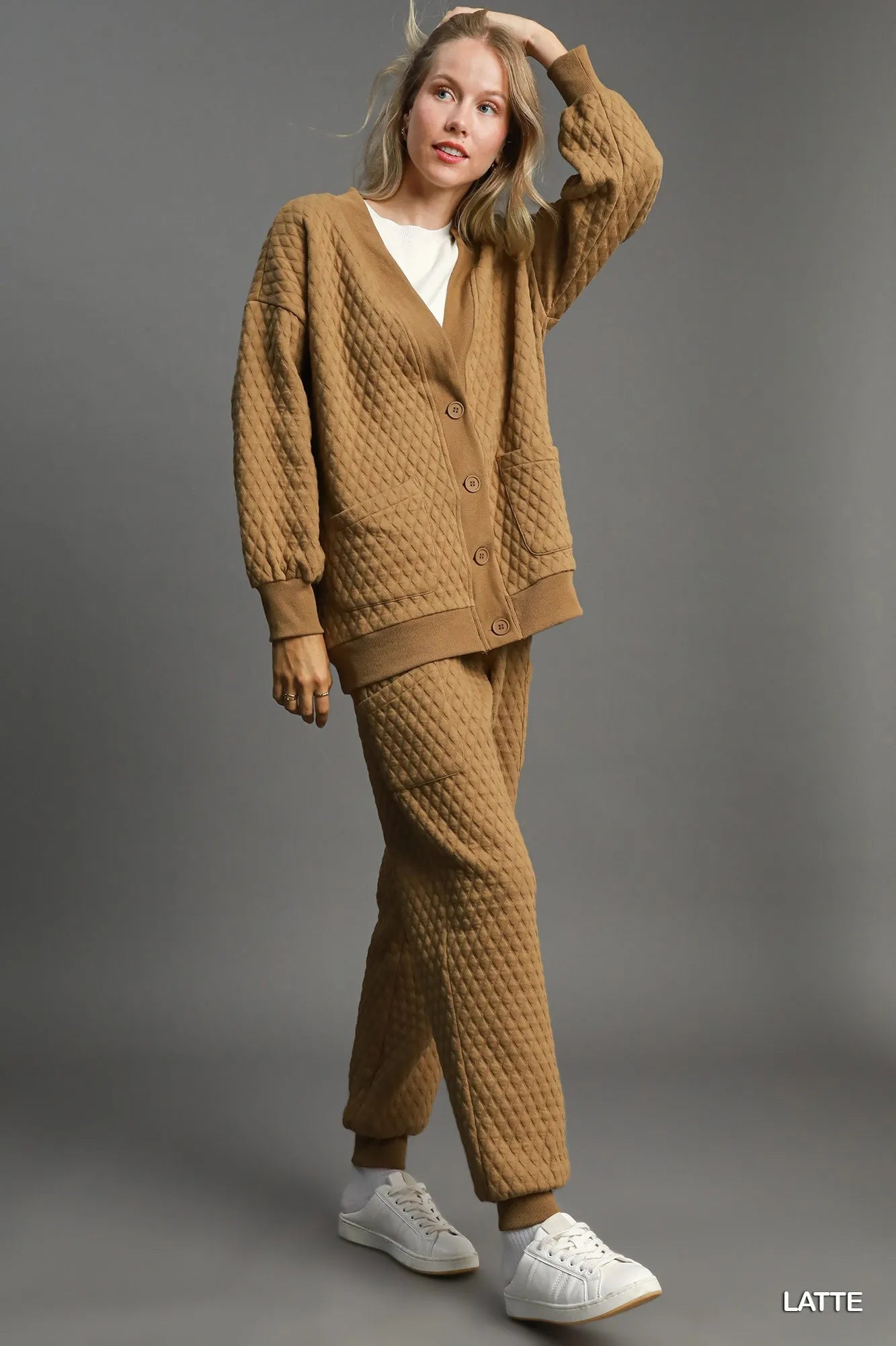 Relaxed fit Jacquard cardigan showcasing soft acrylic blend texture