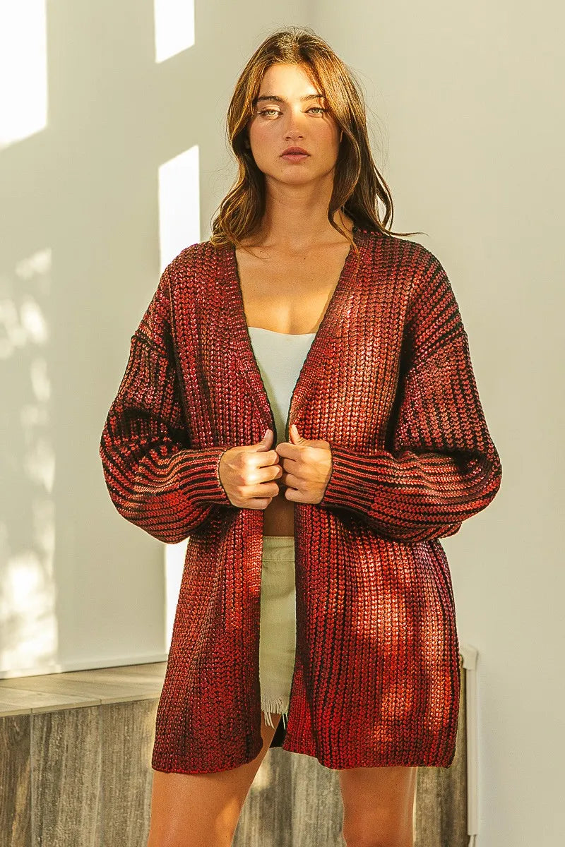 Shimmering red metallic knit V-neck cardigan with loose fit and textured open front