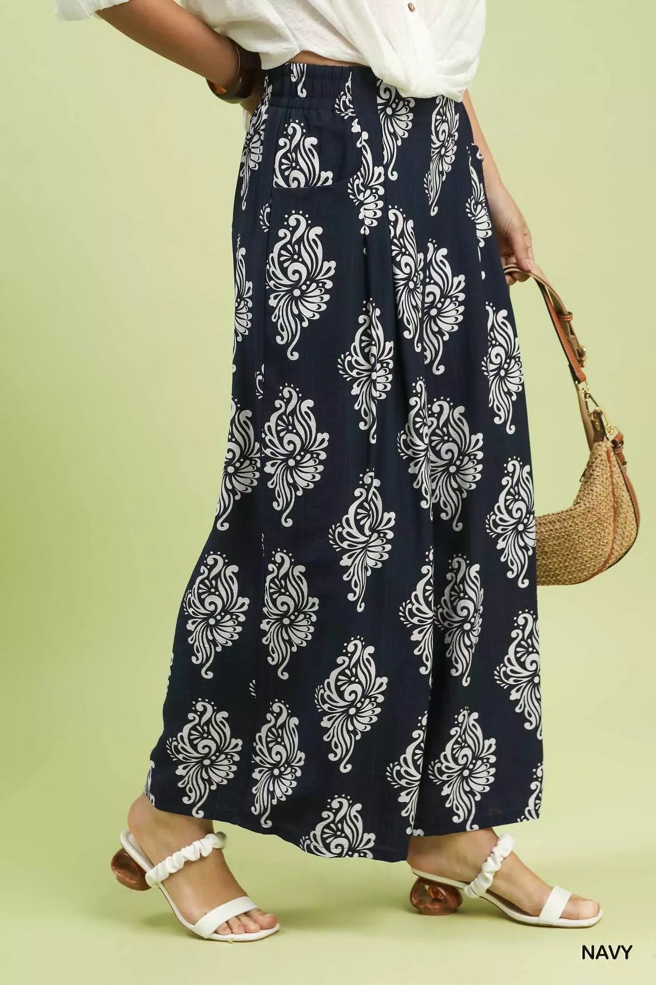 Airy navy wide-leg pants with bold abstract print