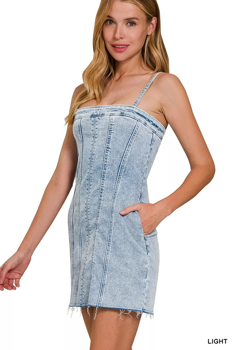Light-wash denim dress with spaghetti straps and exposed seams