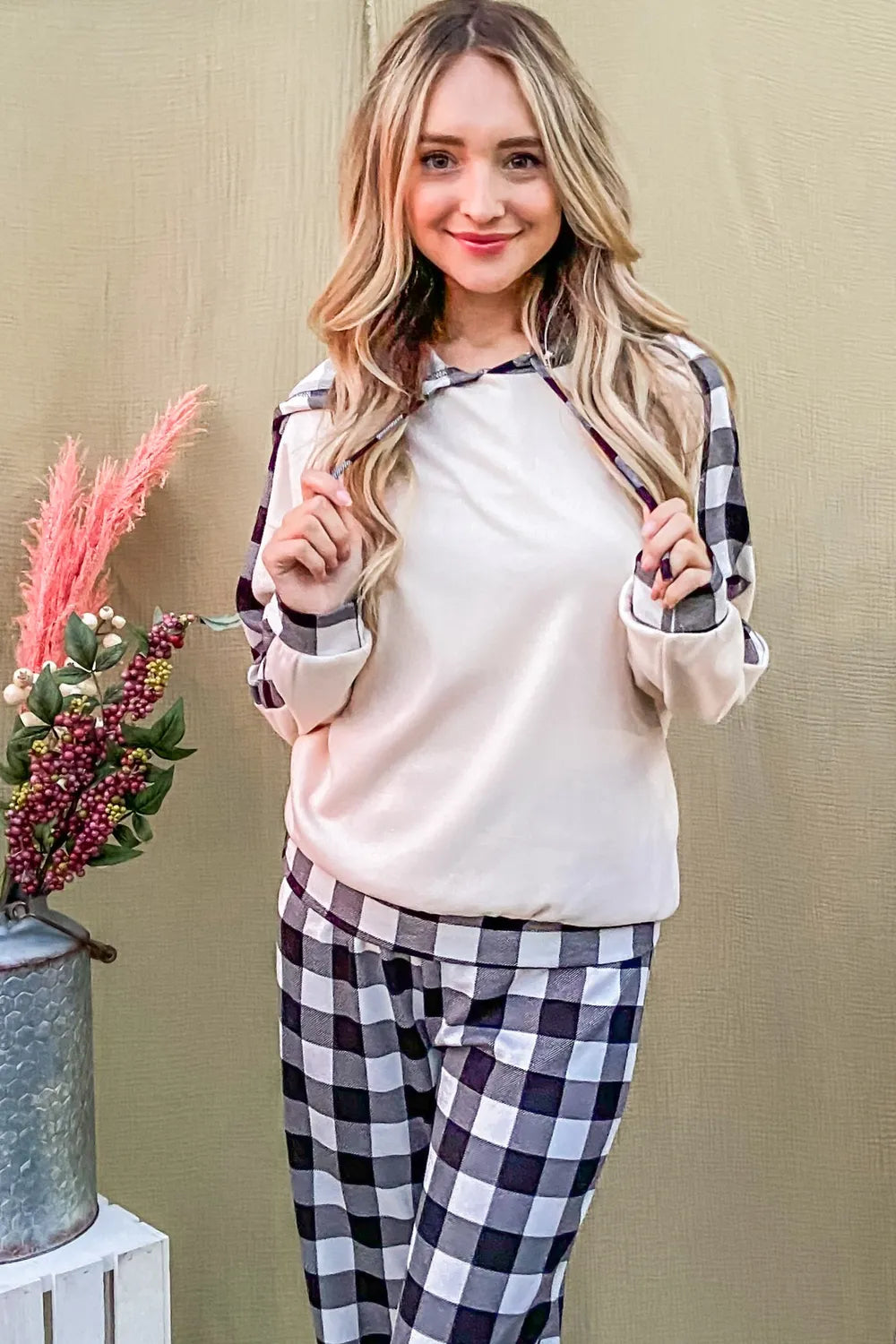 Two-piece lounge set showcasing plaid top and pants ensemble