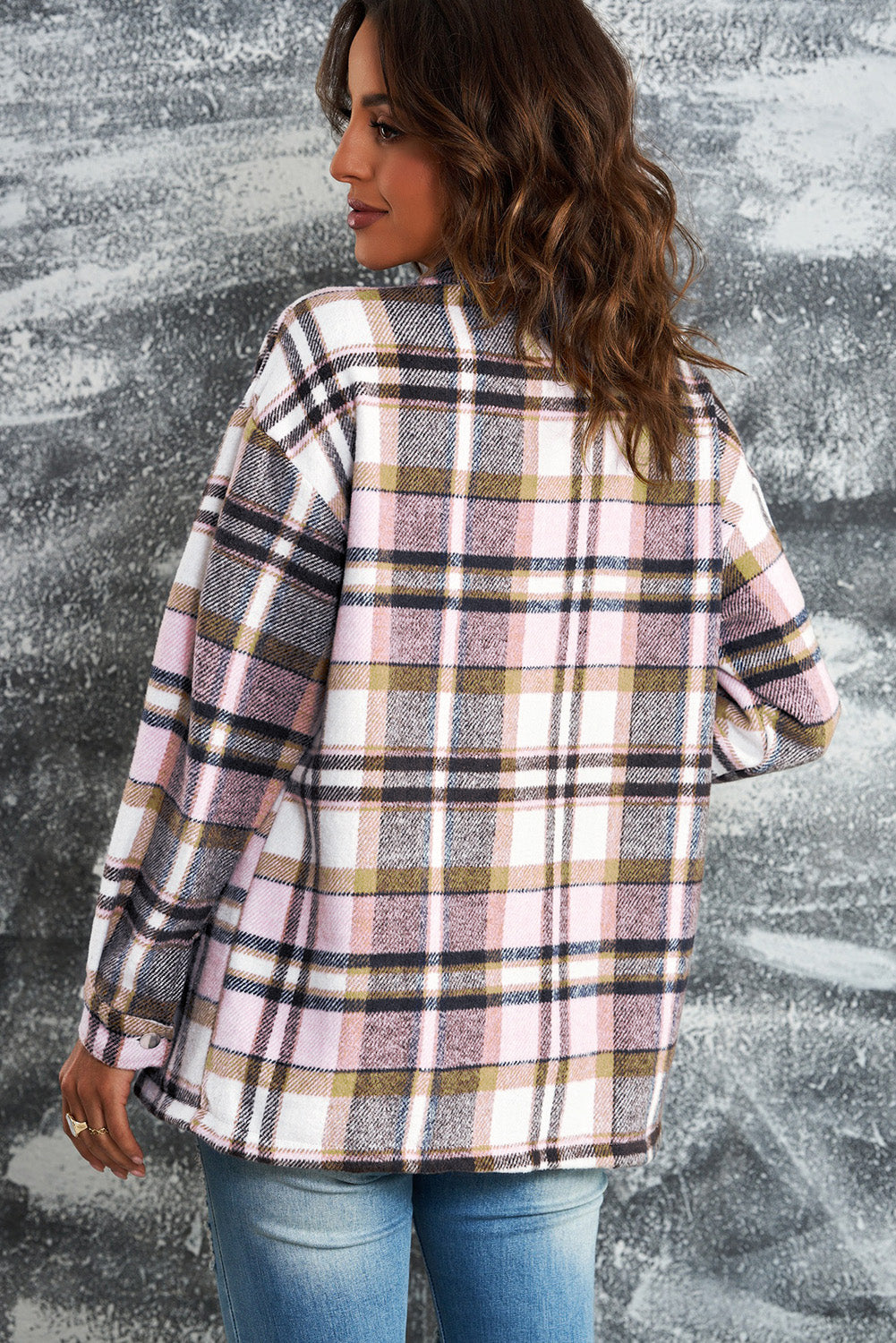Classic plaid pattern shirt jacket with visible button closures and chest pockets