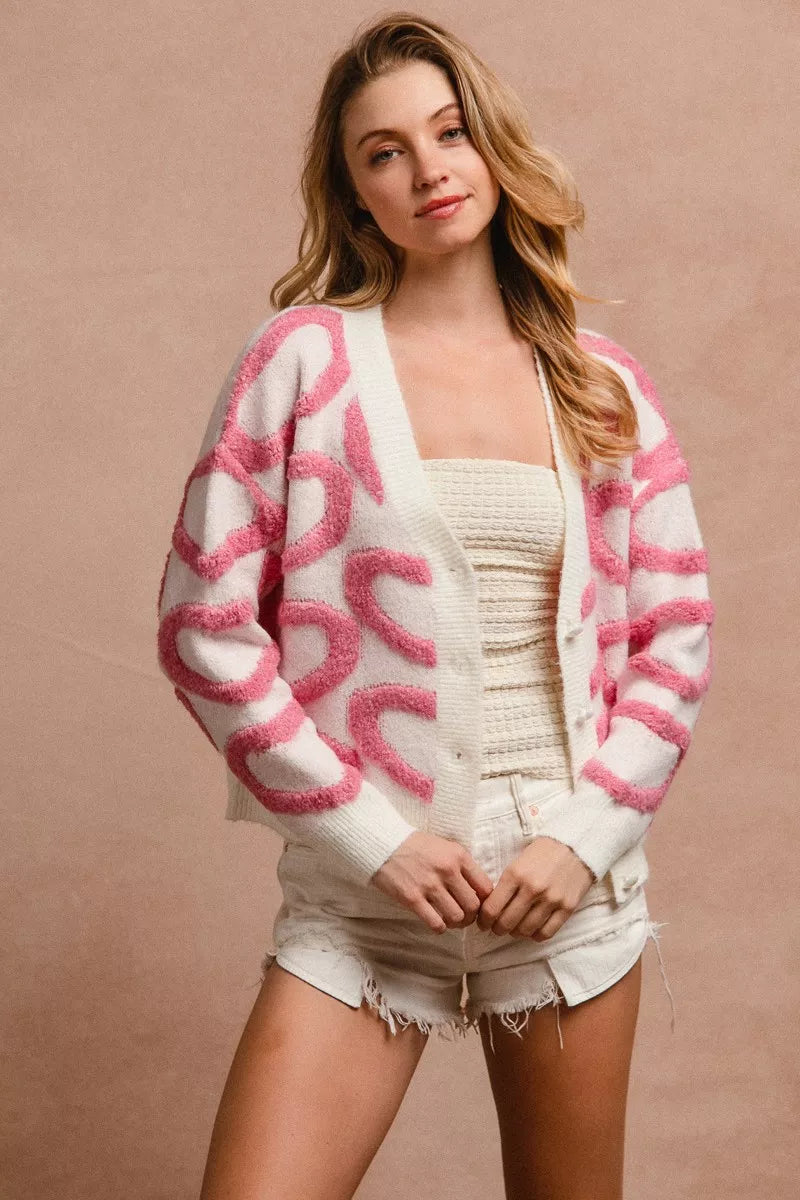 Pink and white textured heart patterned buttoned v neck cardigan with loose fit