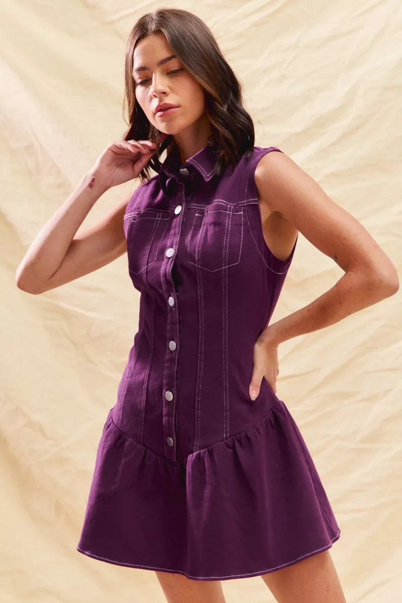 Back view of ruffled mini dress in orchid purple