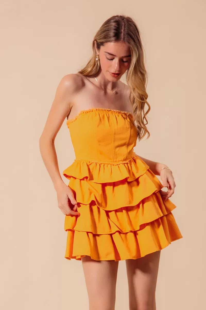 Strapless dress with smocked bodice and layered ruffles