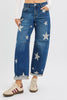 Mid-rise ankle-length relaxed barrel jeans with star print close-up
