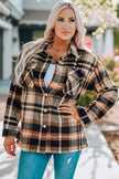 Plaid pattern shirt jacket draped open with visible breast pockets and cuffs