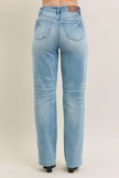 High-waist rigid 90s-style distressed denim jeans, plus fit, mid-wash, structured leg detail.
