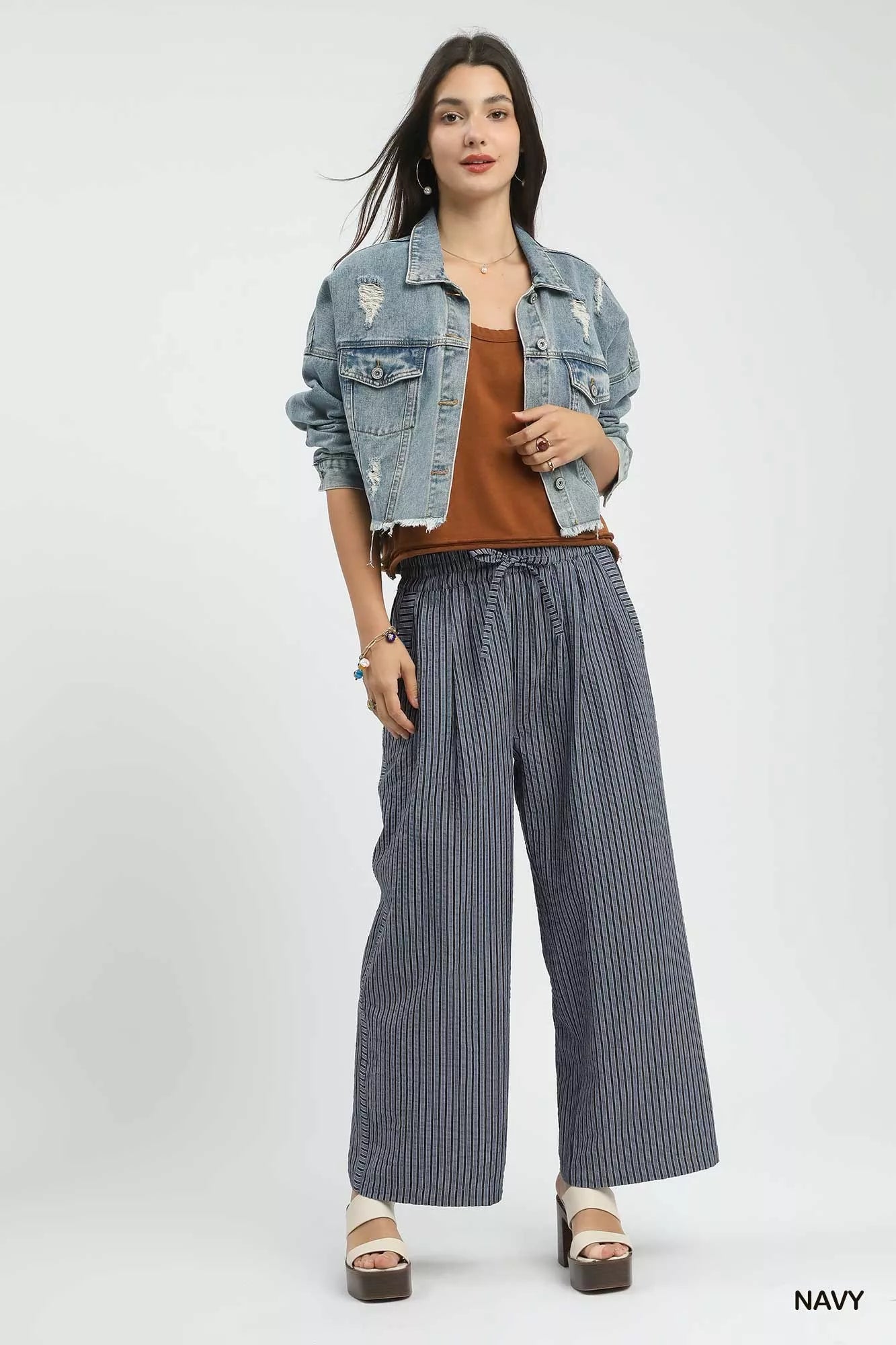 Wide-leg pants showcasing relaxed fit and striped design
