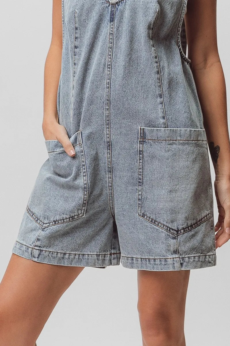 Light-wash denim shortall with patch pockets and relaxed fit texture