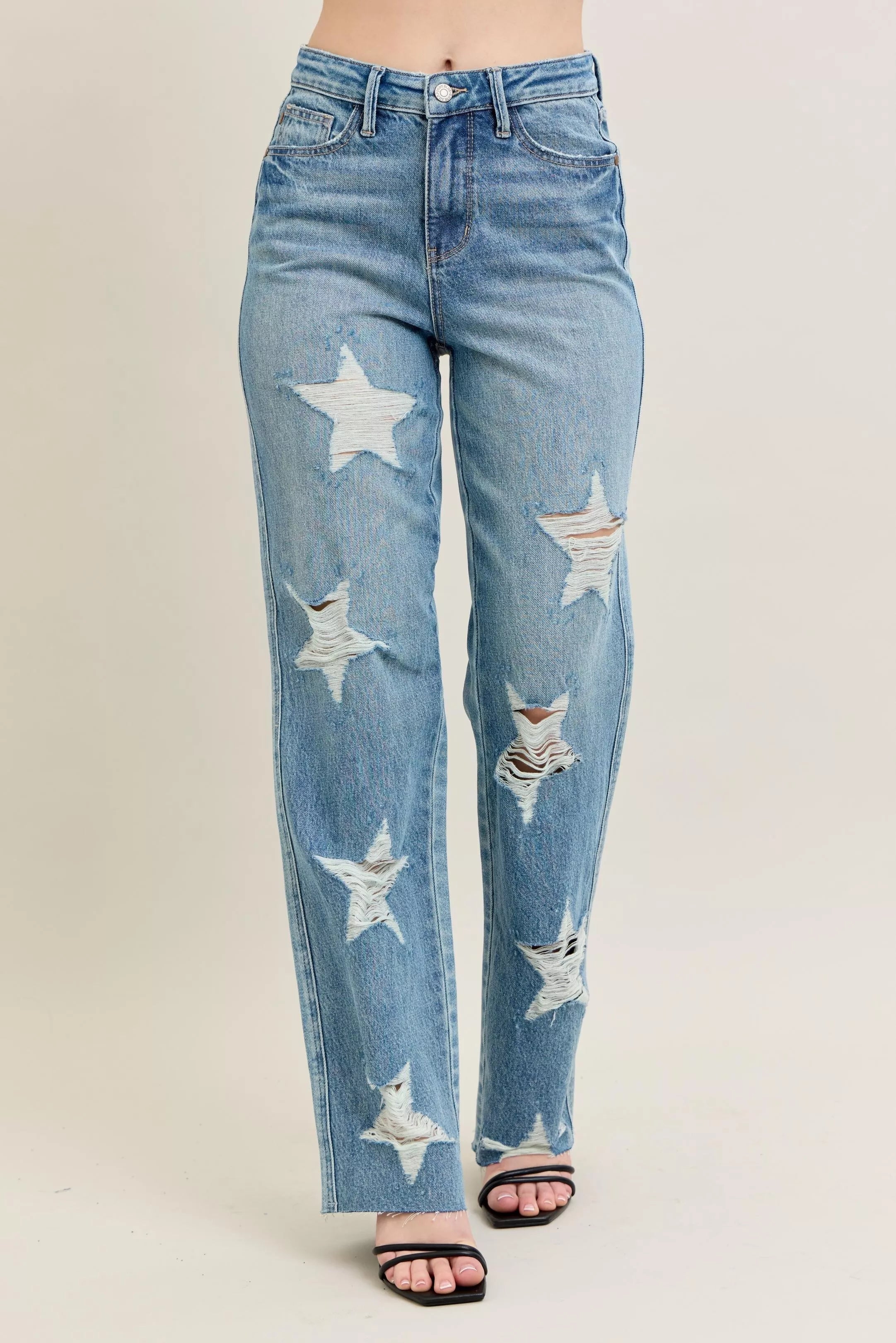 **90s high-waist rigid denim with white distressed star cuts, distressed texture, plus-fit straight leg jeans.**