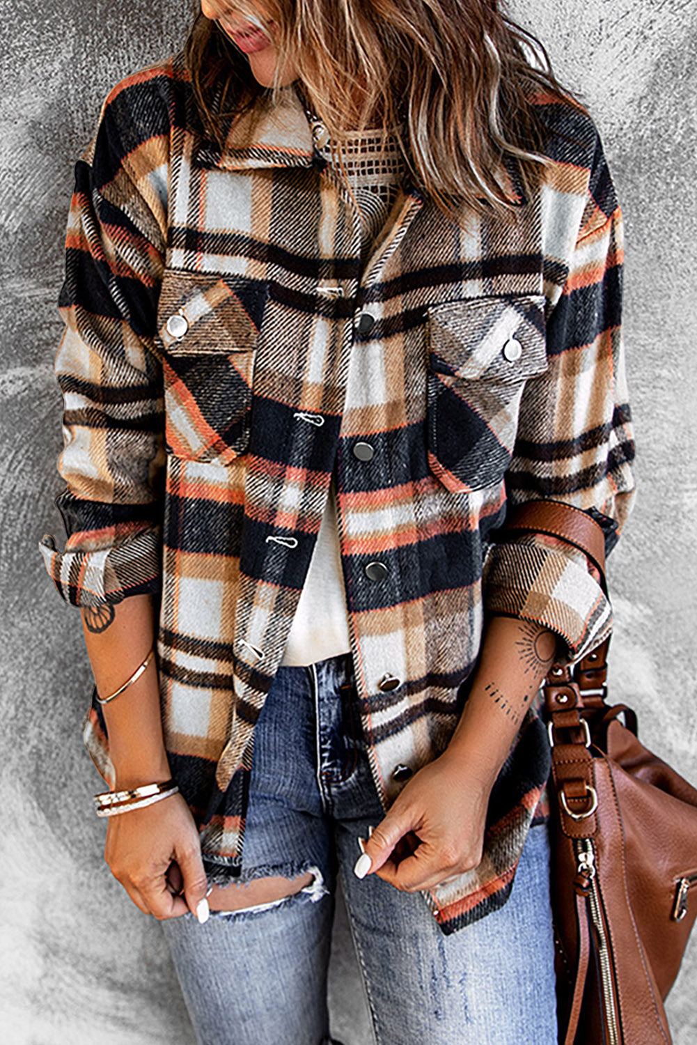 Layering shirt jacket featuring dropped shoulders and relaxed buttoned front