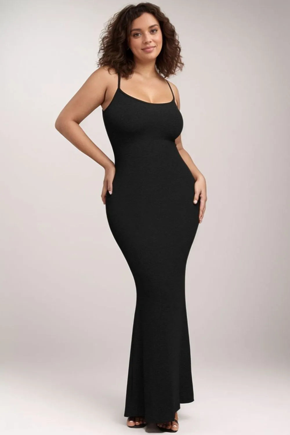 Maxi dress showcasing body contouring design