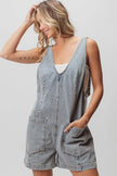 Light-wash denim shortall with patch detail, relaxed fit, front pockets, textured fabric