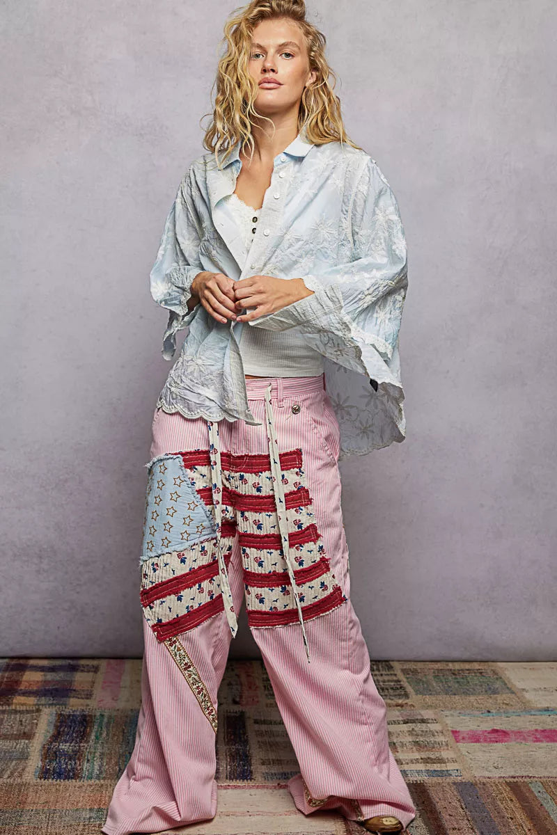 Elegant floral embroidered shirt featuring scalloped collar trim