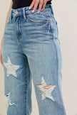 High-waisted 90s straight-leg rigid denim jeans with star-shaped distressed rips, plus size.