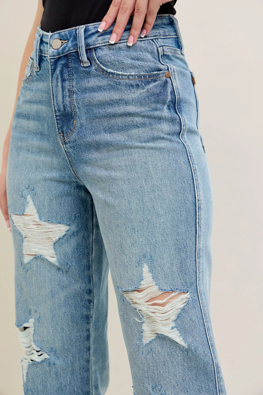 High-waisted 90s straight-leg rigid denim jeans with star-shaped distressed rips, plus size.