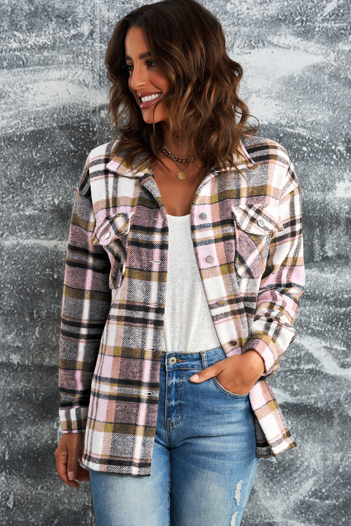 Plaid shirt jacket hanging showing dropped shoulder seam and classic pattern