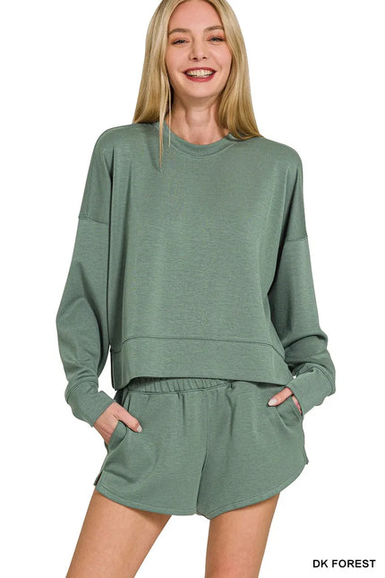 Deep forest green scuba sweatshirt and shorts set displayed on model