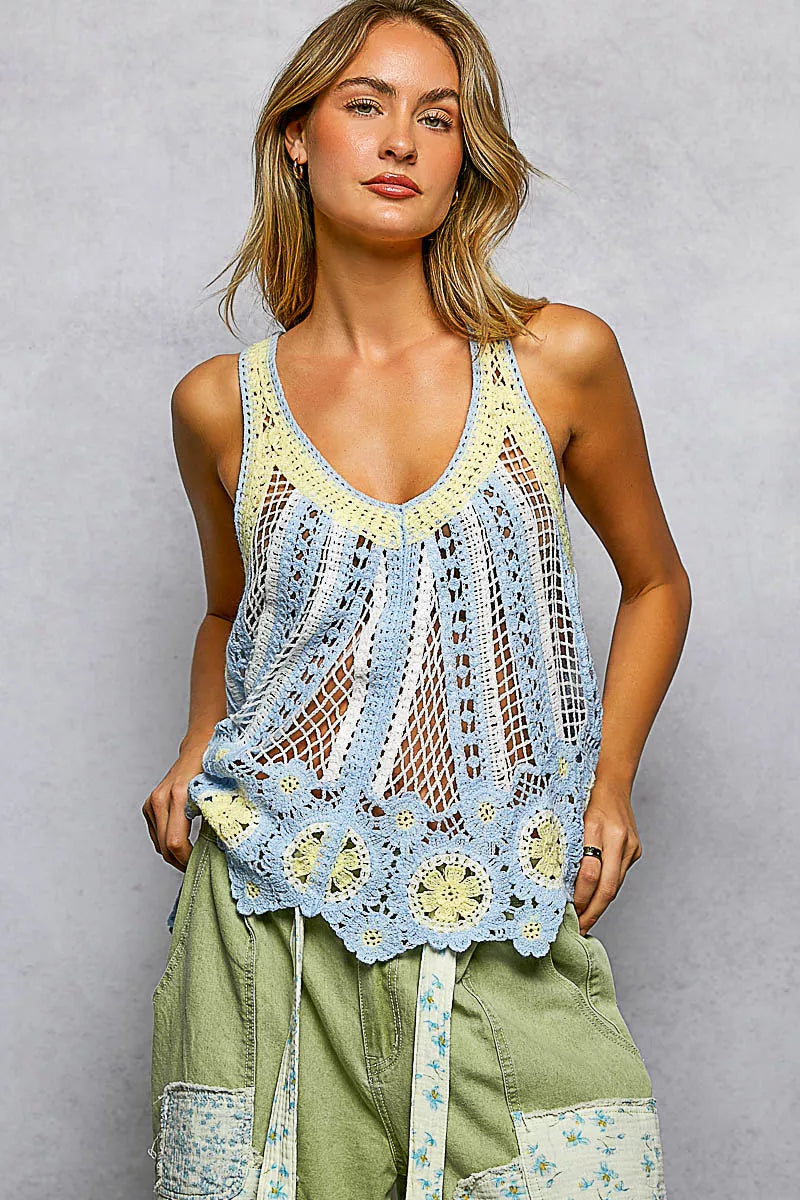 Close-up of scalloped crochet edge on flowy tank top