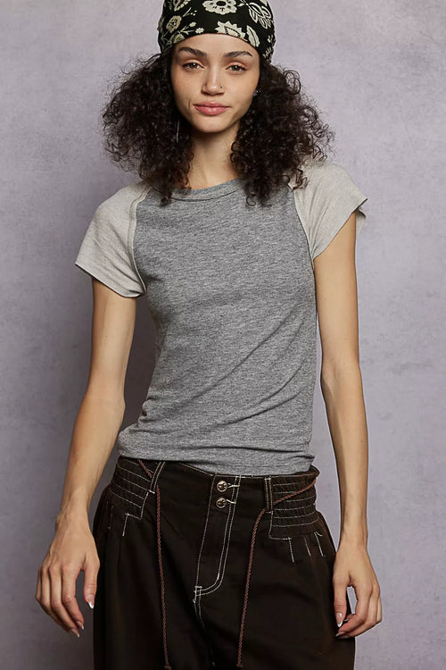 Round neck T-shirt with contrast color sleeves and overlock stitch detail