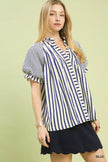 Front view of lightweight striped top with notched neck