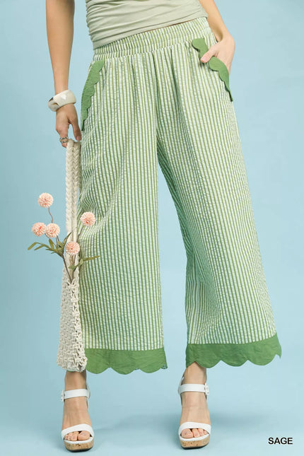 Sage green scallop hem wide-leg pants with vertical pinstripes