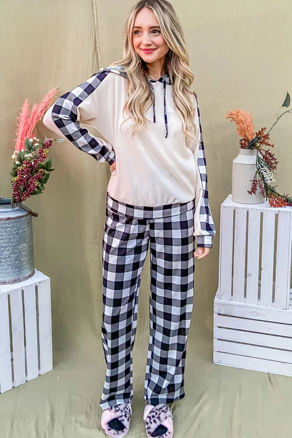 Black and white plaid fabric texture on loungewear top