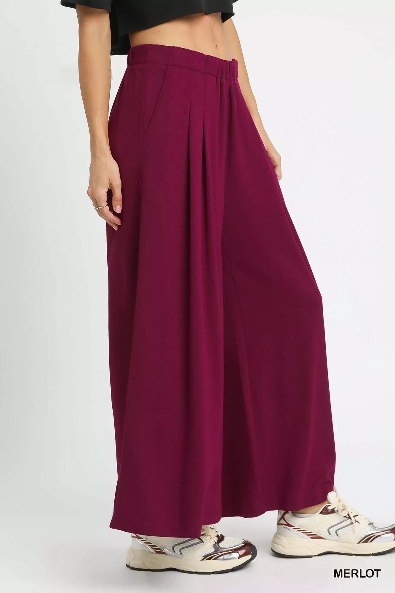 Close-up of lightweight merlot red wide-leg lounge pants