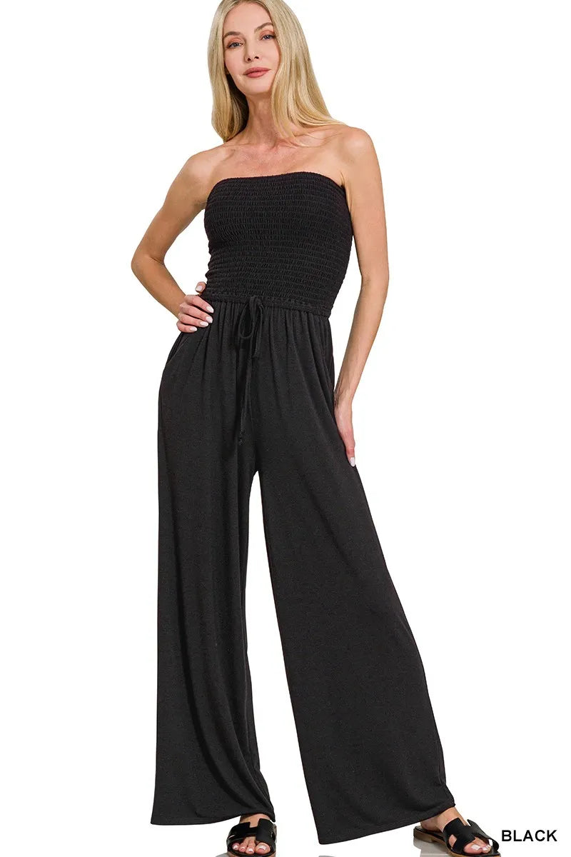 Charcoal black strapless smocked bodice jumpsuit with wide-leg pants