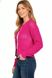 Button-down crochet cardigan showcasing delicate openwork patterns in pink