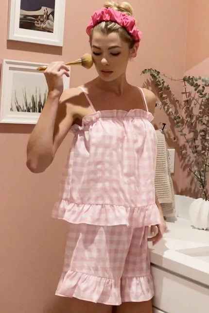 Blush pink gingham pajama set with ruffle trim details