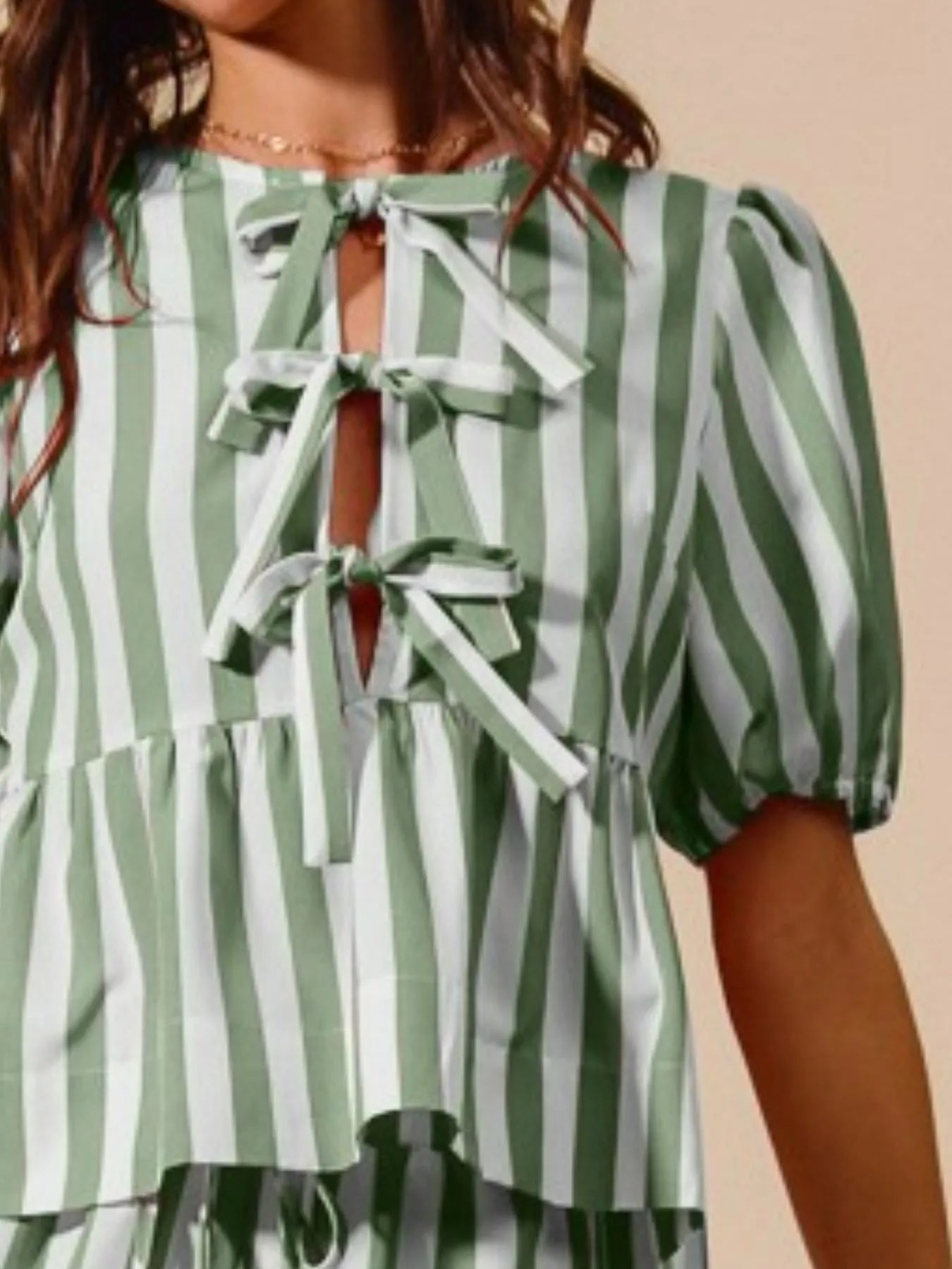 Wide-leg pants showcasing relaxed fit and subtle stripe detail