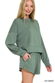 Two-piece scuba set showcasing sleek long-sleeve sweatshirt and shorts