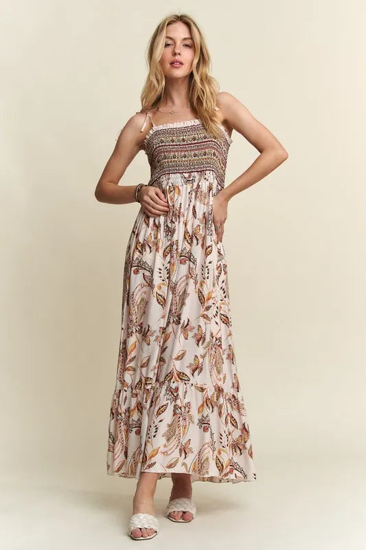 Side view of sheer rayon midi dress showcasing flowy silhouette and smocked bodice