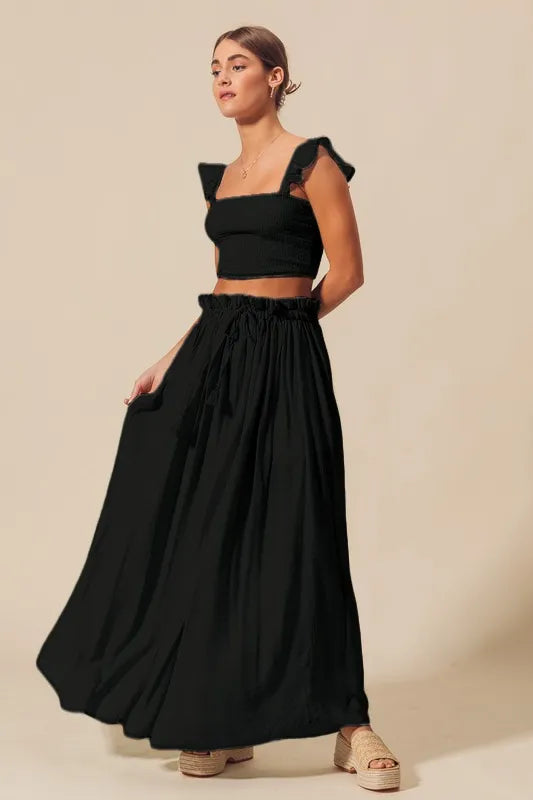 Flowy charcoal maxi skirt with high waist and side slit detail