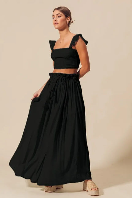 Flowy charcoal maxi skirt with high waist and side slit detail
