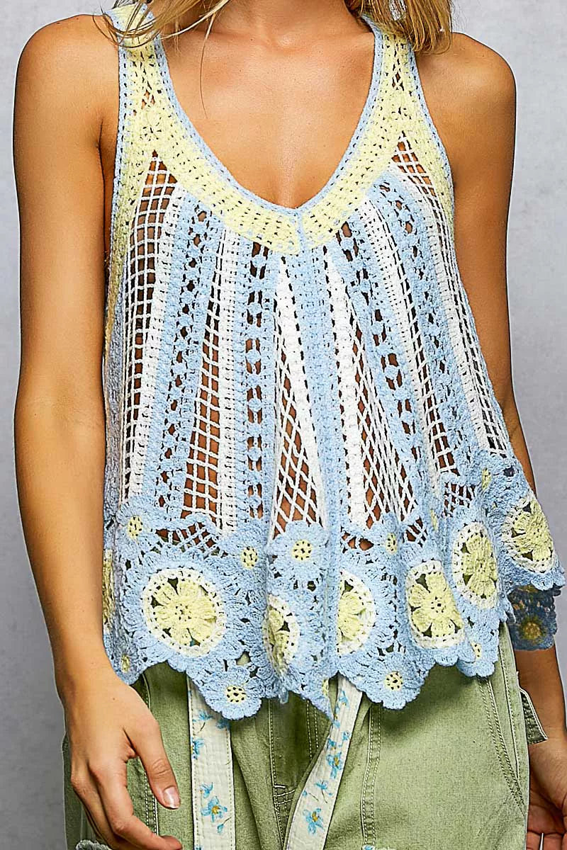 Crochet top displaying openwork design and relaxed fit silhouette