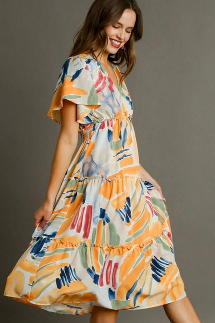 Vibrant abstract print flutter sleeve tiered midi dress with ruffled hem and smocked waist