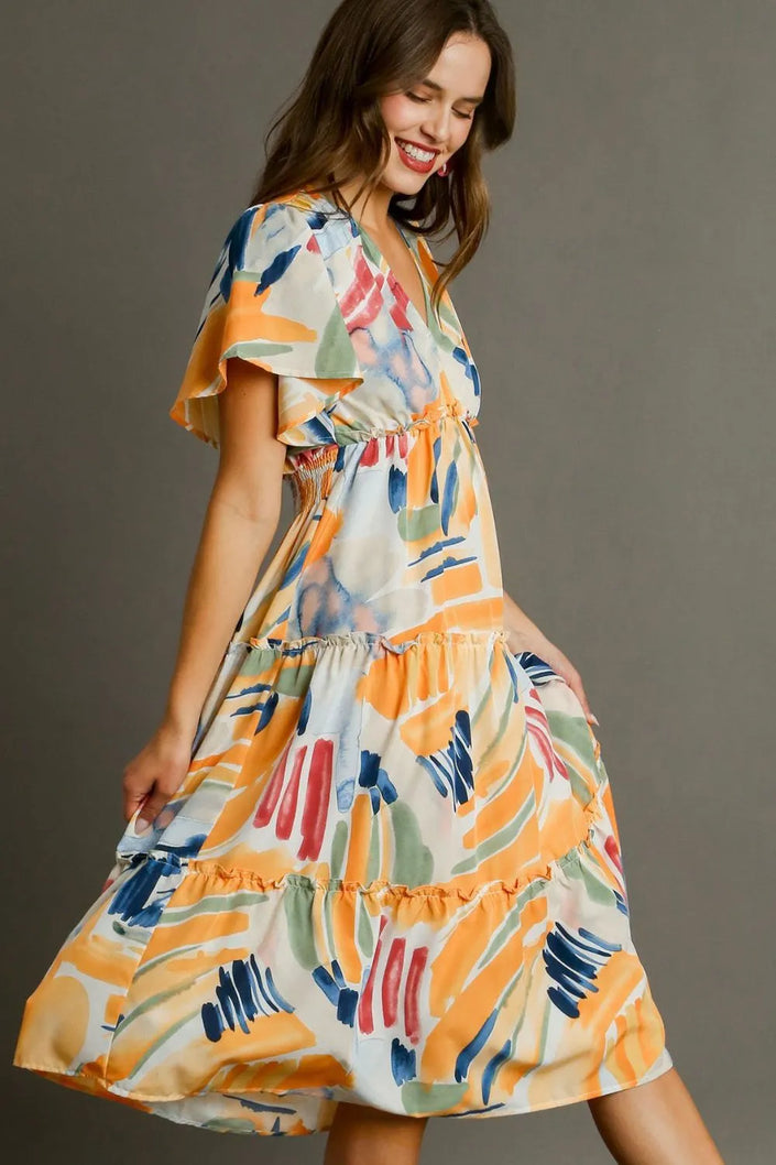 Vibrant abstract print flutter sleeve tiered midi dress with ruffled hem and smocked waist