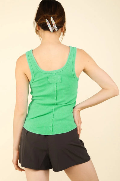 Green ribbed tank top with back placket detail and fitted silhouette shown from rear view