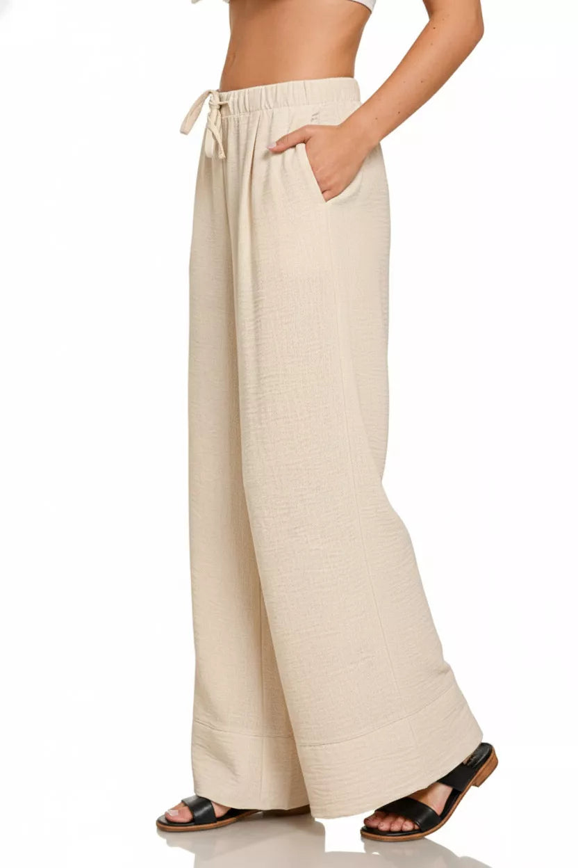 Breathable woven fabric drawstring pants in neutral tone